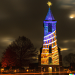 DALL·E 2023-12-22 20.20.54 – combineer kerst met de kerktoren van haren